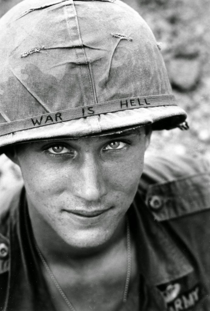 During the Vietnam War on June 18, 1965 173rd Airborne Brigade Battalion member Larry Wayne Chaffin smiles for the camera.